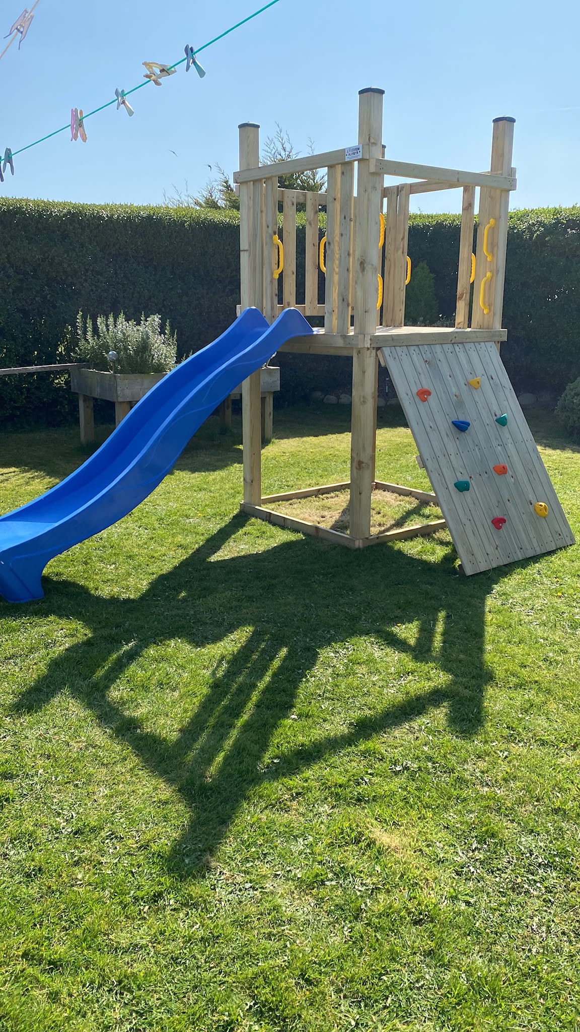 Look Out Tower with rock-climb wall and wave slide